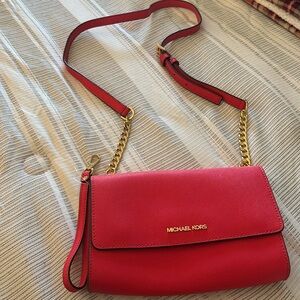 MK-Jet Set Travel,wrist clutch, cross body leather